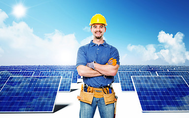 Image showing smiling worker and solar power