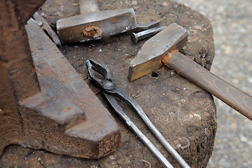 Image showing Hammer and Tongs