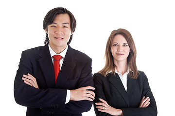 Image showing Confident Asian Man Caucasian Woman Business Suits Arms Crossed