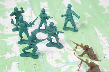 Image showing Plastic Army Men Fighting on Topographic Map