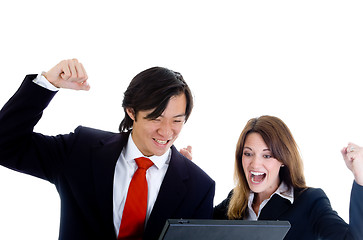 Image showing Happy Business Team, Asian Man Caucasian Woman Cheering at Lapto