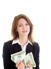 Image showing Unhappy Woman Holding Torn Stock Market Crash