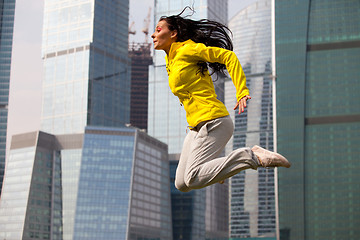 Image showing brunette jumping