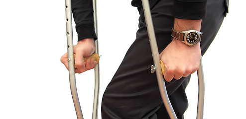 Image showing walking with crutches