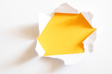 Image showing yellow hole in paper