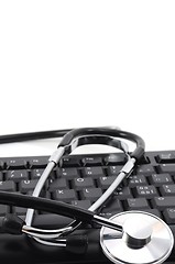 Image showing stethoscope on computer keyboard