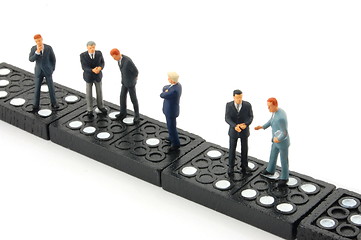 Image showing business man on domino 