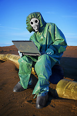 Image showing Ecologist scientist in ecological disaster zone