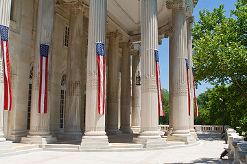 Image showing Narrow American Flags Columns Building Washington