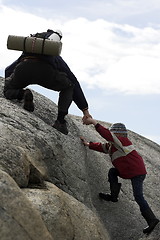 Image showing A father helping his child.