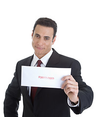 Image showing Front Smug Businessman Holding Envelope Marked Foreclosed, Isola