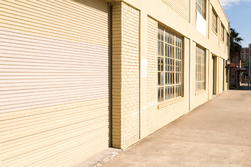 Image showing Warehouse Door and Loading Dock, Beige Brick