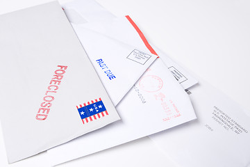 Image showing Pile Mail Stamped FORECLOSED PAST DUE Isolated