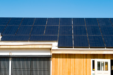 Image showing Modern House Photovoltaic PV Solar Panels Roof Sky