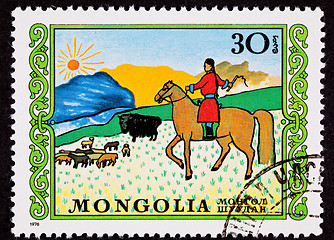 Image showing Canceled Mongolian Postage Stamp Horseback Woman Herding Sheep Y