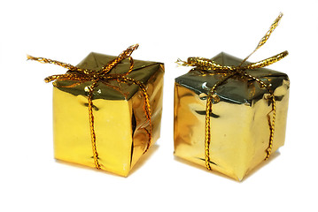 Image showing Golden gift boxes