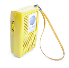 Image showing Vintage Yellow Plastic Transistor Radio Isolated on White