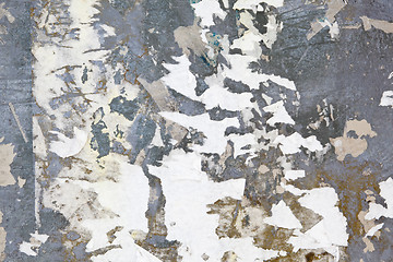 Image showing XXXL Full Frame Grungy Metal Surface Covered Torn Poster Scraps