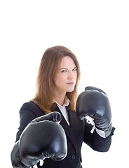 Image showing Angry Businesswoman Wearing Boxing Gloves Isolated