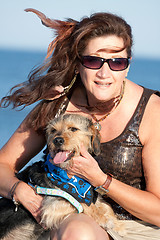 Image showing Woman Holding Her Pet Dog