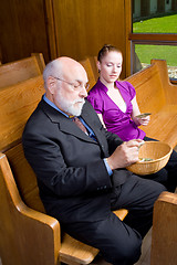 Image showing Senior White Man Young Woman Donating Money Church