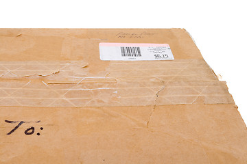 Image showing Old Cardboard Box To Metered Mail Sticker Isolated