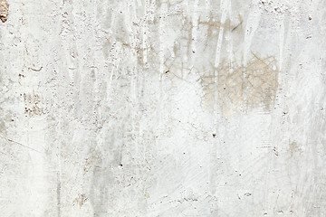 Image showing Full Frame Grungy Dirty Painted Cement Wall with Dripping Paint