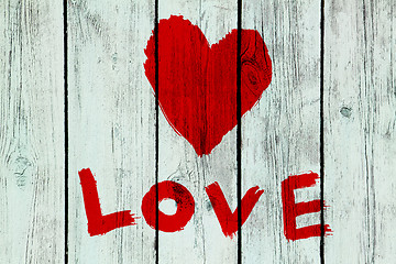 Image showing love symbol on old wooden wall