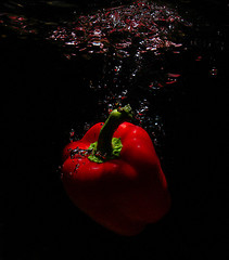 Image showing red food in water