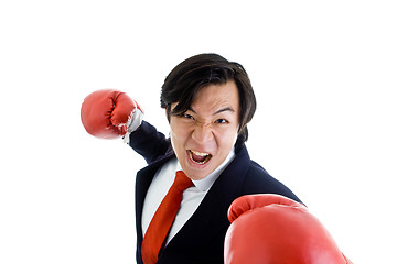 Image showing Angry Asian Business Man Boxing Gloves Punching