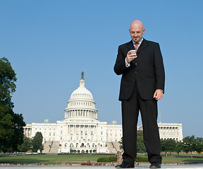 Image showing Smiling White Lobbyist Standing Front US Capitol 