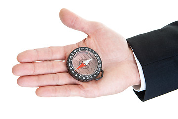 Image showing Man's Hand Holding Clear Compass Isolated on White Background