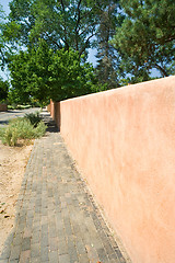 Image showing Adobe Wall to a Vanishing Point Sidewalk Santa Fe