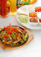 Image showing original fajita sizzling hot  on iron plate