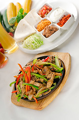 Image showing original fajita sizzling hot  on iron plate