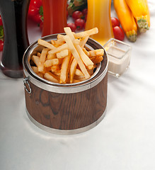 Image showing fresh french fries on a bucket