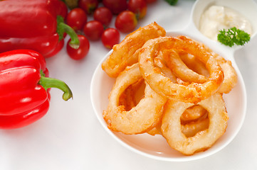 Image showing golden deep fried onion rings 