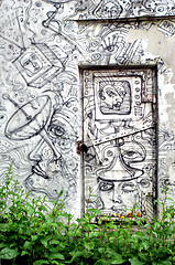 Image showing Graffiti on doors and wall 