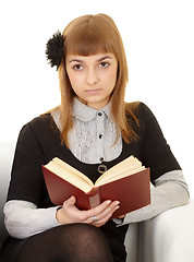 Image showing Young woman reads a book