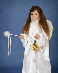 Image showing Child dressed as an angel with a magic wand