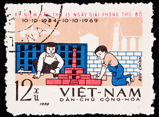 Image showing Canceled North Vietnamese Postage Stamp Children Playing Buildin