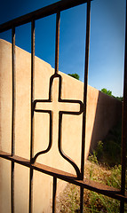 Image showing Cross Shape Iron Gate Adobe Wall Blue Sky Vignette