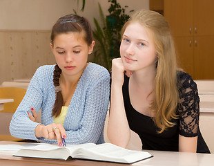 Image showing Female students are engaged in the classroom