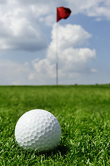 Image showing golf ball and flag