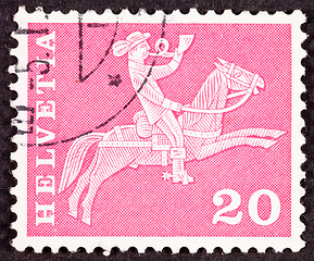 Image showing Swiss Postage Stamp Horseback Mail Delivery, Rider Blowing Posta