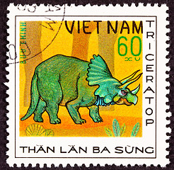 Image showing Canceled Vietnamese Postage Stamp Green Triceratops Dinosaur in 