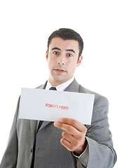 Image showing Hispanic Businessman Holding Foreclosure Notice Isolated Backgro