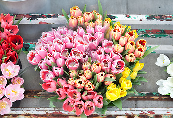 Image showing Bouquet of Flowers Tulips in a Old Metal Flourist Display