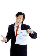 Image showing Asian Man Suit Shrugging Gesturing, Holding Past Due Medical Bil