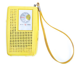 Image showing Vintage Yellow Plastic Transistor Radio Isolated White Backgroun
